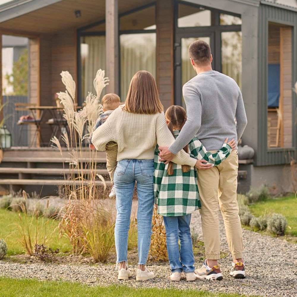 Family outside a home